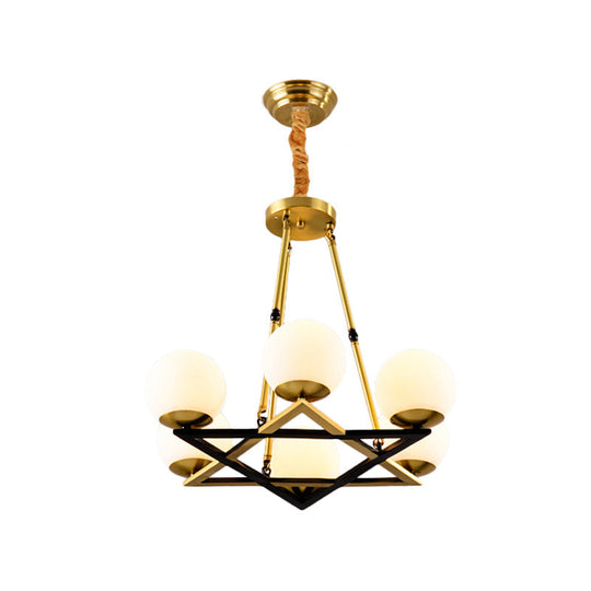 Postmodern Polygon Metal Chandelier With Brass Finish And Globe White Glass Shades