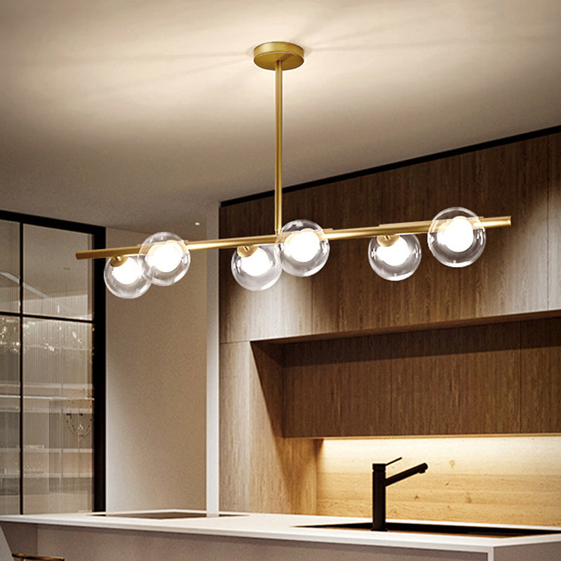 Nordic Metal 6-Head Linear Island Light With Gold Finish And Clear Glass Globes