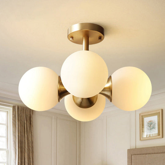 Contemporary Gold Ball Semi Flush Ceiling Light With 4 Milky Glass Heads
