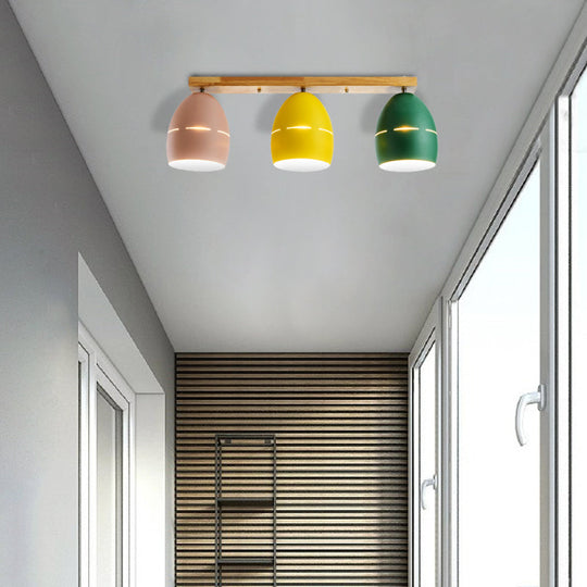 Nordic Wood Finish Linear Semi-Flushmount Light: 3 Lights And Oval Metal Shade Green-Yellow-Pink