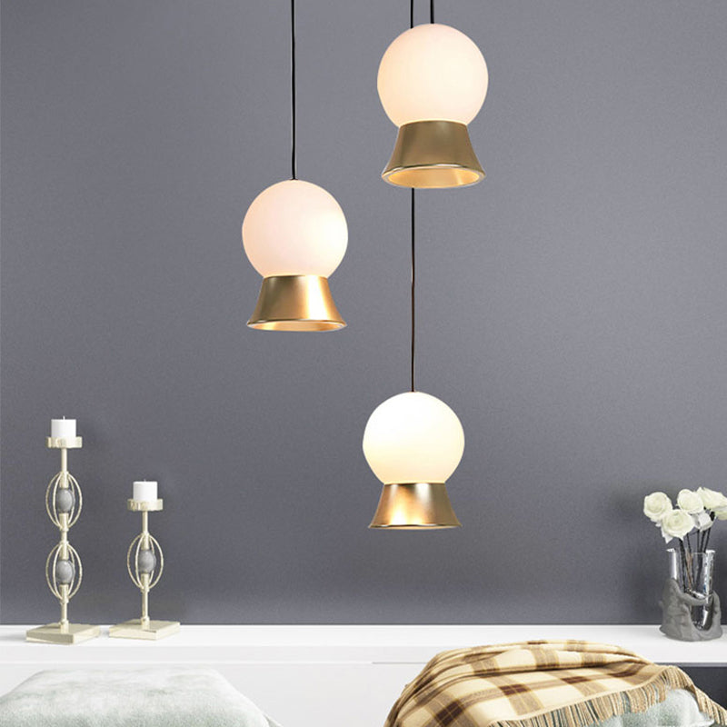 Modern White Glass Globe Pendant Light With Gold/Black Metal Shade