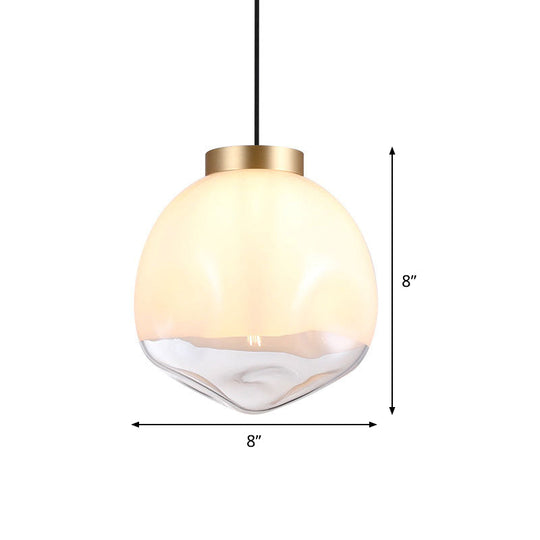 Modern Globe Pendant Light With Dimpled Glass In White And Clear Brass Finish