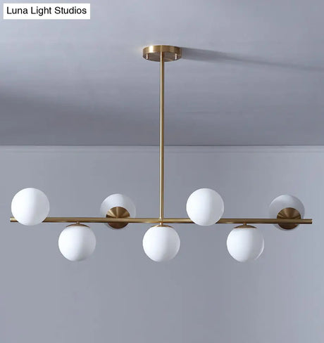 7-Light Modern Gold Metal Island Pendant With Spherical White Glass - Ideal For Dining Table