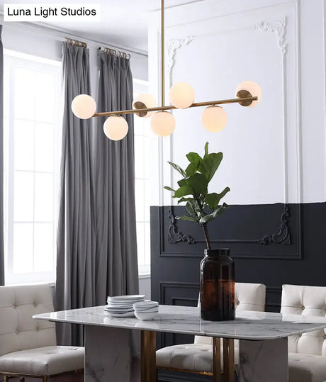 7-Light Modern Gold Metal Island Pendant With Spherical White Glass - Ideal For Dining Table