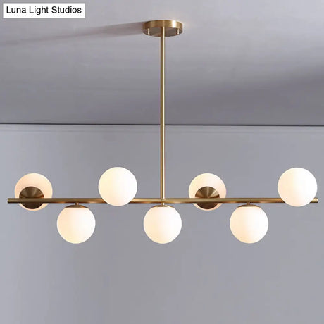7-Light Modern Gold Metal Island Pendant With Spherical White Glass - Ideal For Dining Table