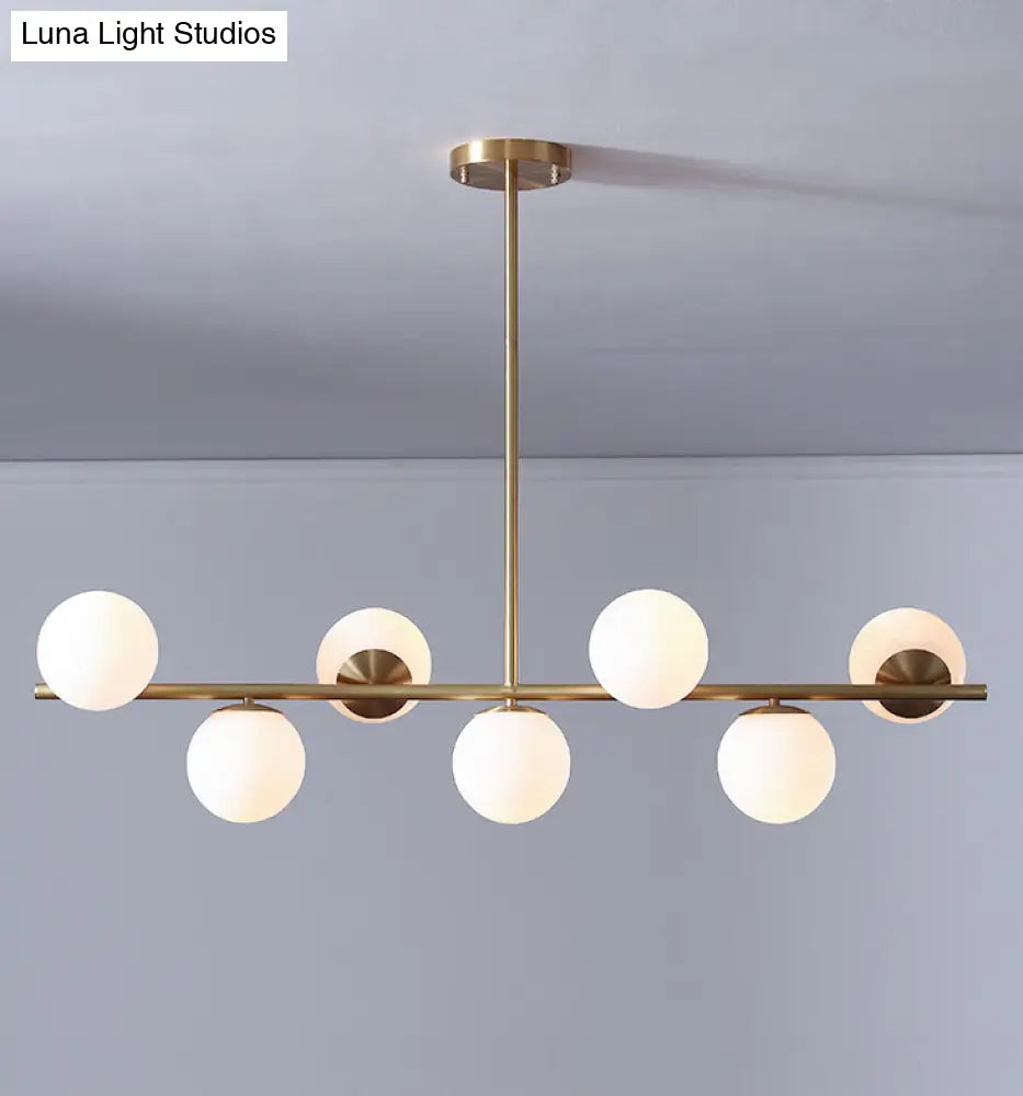 7-Light Modern Gold Metal Island Pendant With Spherical White Glass - Ideal For Dining Table