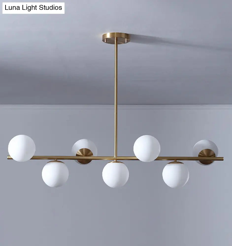 7-Light Modern Gold Metal Island Pendant With Spherical White Glass - Ideal For Dining Table