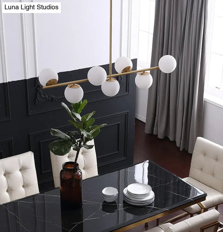 7-Light Modern Gold Metal Island Pendant With Spherical White Glass - Ideal For Dining Table