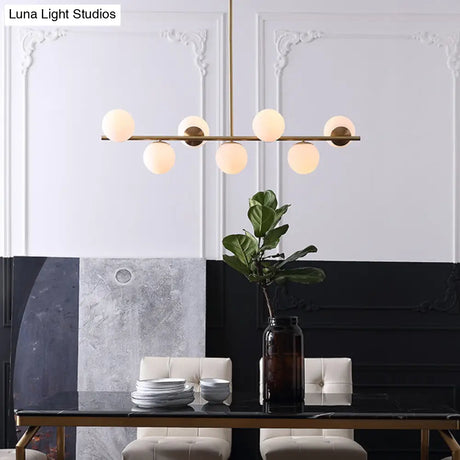 7-Light Modern Gold Metal Island Pendant With Spherical White Glass - Ideal For Dining Table