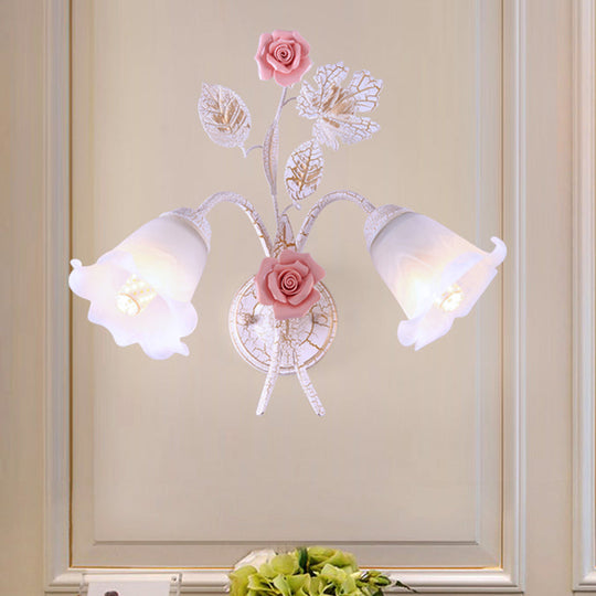 Pastoral Floral White Glass Wall Sconce With Metal Curved Arm For Living Room - 1/2-Light Mount Lamp