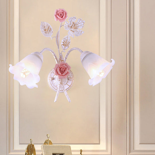 Pastoral Floral White Glass Wall Sconce With Metal Curved Arm For Living Room - 1/2-Light Mount Lamp