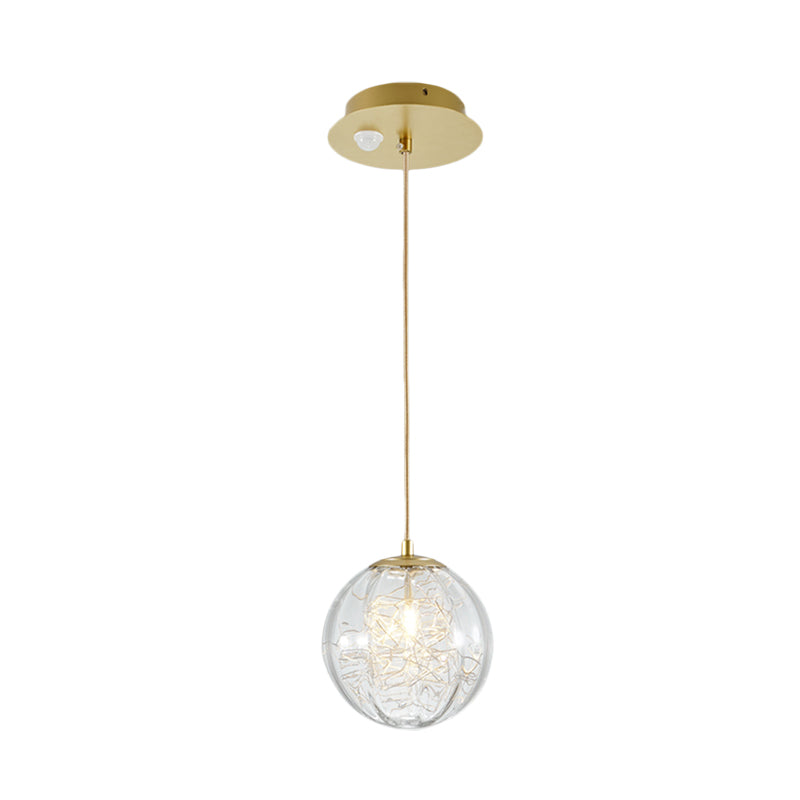 Modern Brass Pumpkin Ball Pendant Lamp With Clear Glass For Bedside Lighting