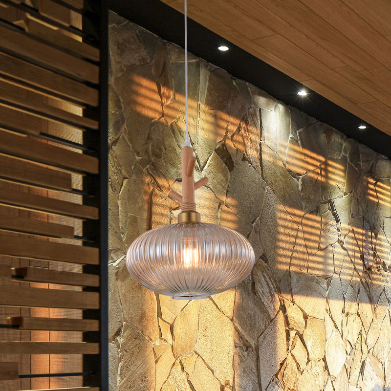 Modern Amber Glass Oval Pendant Lamp With Prismatic Design And Wooden Branch Cap