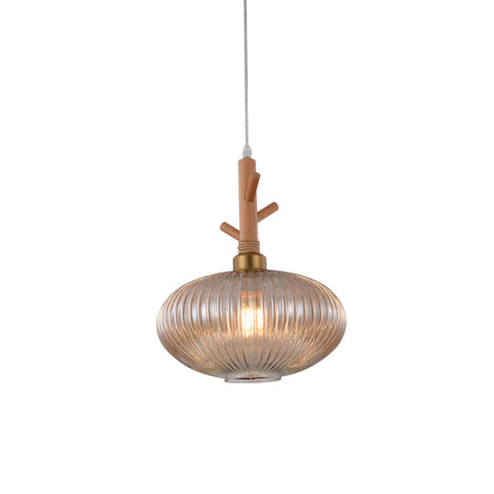 Modern Amber Glass Oval Pendant Lamp With Prismatic Design And Wooden Branch Cap