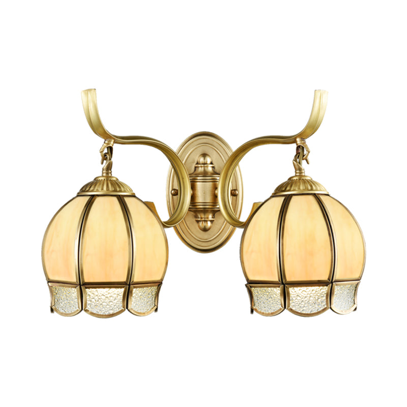 Traditional Tan Glass Brass Finish Sconce Light With Swirl Arm