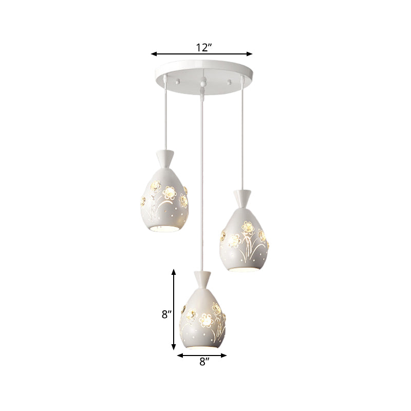 Modern White Wine Can-Shaped Pendant Light With Laser Cut Flower Design - Multi-Head Iron Hanging