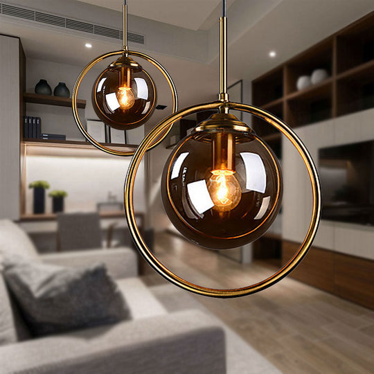 Plafonnier suspendu à 1 ampoule en forme de boule de verre avec cadre en anneau - Design post-moderniste