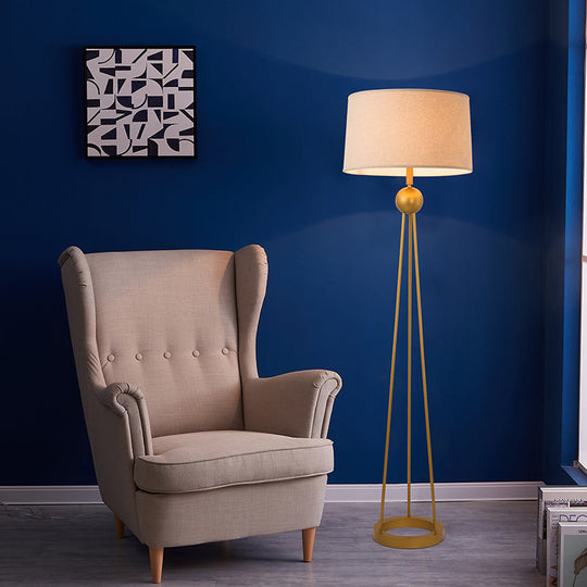 Modernist 1-Light Tripod Floor Lamp In White/Black/Flaxen With Drum Fabric Shade For Living Room