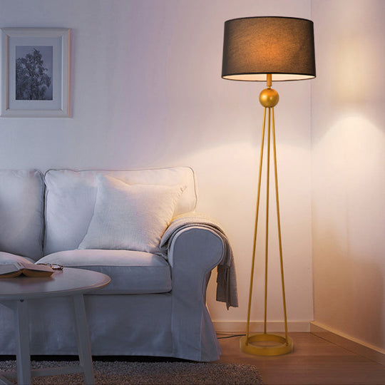 Modernist 1-Light Tripod Floor Lamp In White/Black/Flaxen With Drum Fabric Shade For Living Room