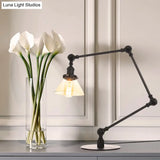Adjustable Arm Industrial Table Lamp With Clear Glass Shade - Black/Brass Finish