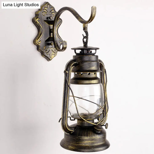 Antique Style Single-Bulb Oil Lantern Sconce: Clear Glass Wall Mount Light For Aisles Bronze /