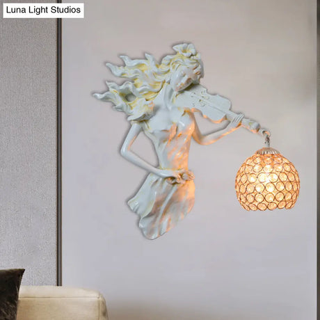 Antiqued Girl With Violin Wall Lamp: Single Bulb Resin Sconce Clear Crystal Shade In White/Gold
