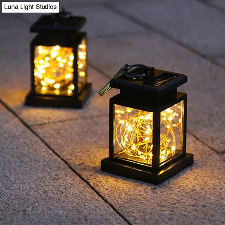 Artistic Black Led Solar Lantern Pendant Light With Clear Glass Clamp And Hook