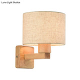 Asian Inspired Drum Wall Lamp With Wood Arm And Fabric Shade 1-Light Fixture For Bedroom