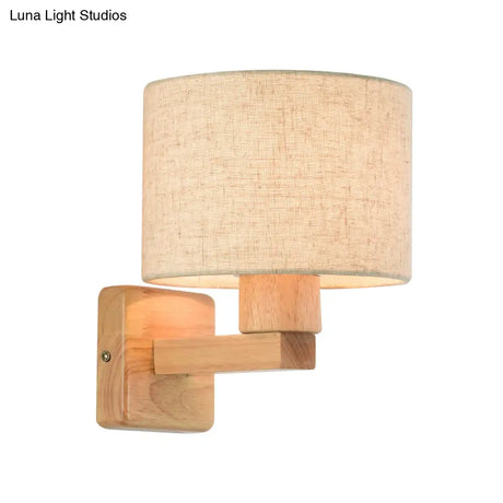 Asian Inspired Drum Wall Lamp With Wood Arm And Fabric Shade 1-Light Fixture For Bedroom