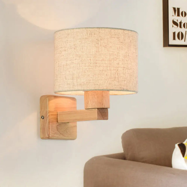 Asian Inspired Drum Wall Lamp With Wood Arm And Fabric Shade 1-Light Fixture For Bedroom