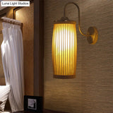 Asian Style Cylinder Bamboo And Metal Wall Lamp With Gooseneck Arm - 1 Bulb Beige Shade