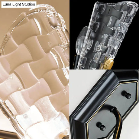 Black Modernist Wall Sconce With Curved Metal Arm And Clear Crystal Panel