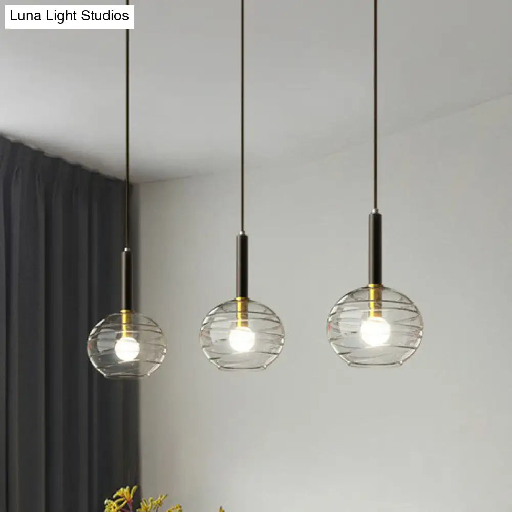 Black Textured Glass Dining Room Pendant With Modern Spherical Hanging Design