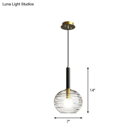 Black Textured Glass Dining Room Pendant With Modern Spherical Hanging Design