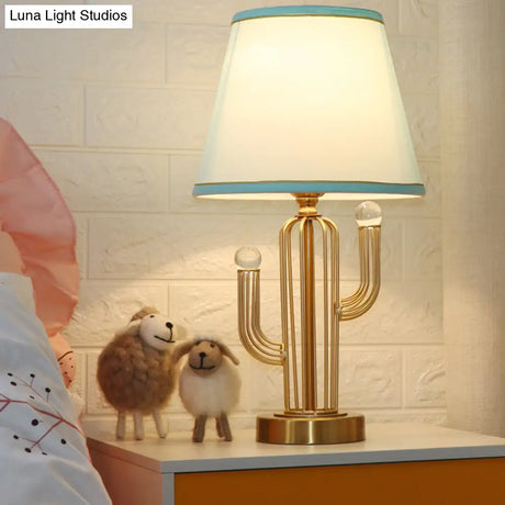 Blue Fabric Cone Night Table Lamp With Clear Crystal Orbit Decor And Metal Base