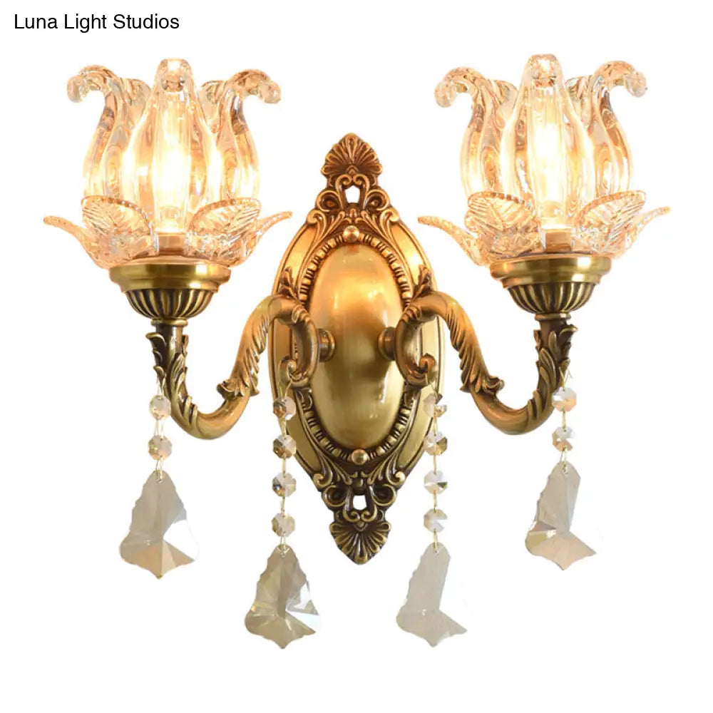 Brass Wall Mount Sconce With Clear Glass 1/2-Light For A Classic Floral Look