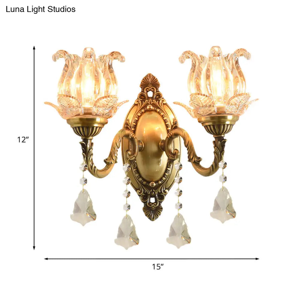 Brass Wall Mount Sconce With Clear Glass 1/2-Light For A Classic Floral Look