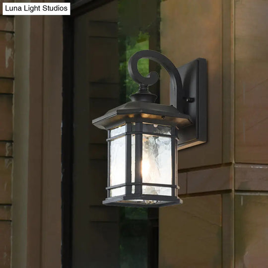 Bronze Curvy Arm Outdoor Wall Sconce With Clear Ripple Glass