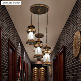 Coastal Kerosene 3-Head Pendant Lamp In Brass With Clear Ribbed Glass Shade