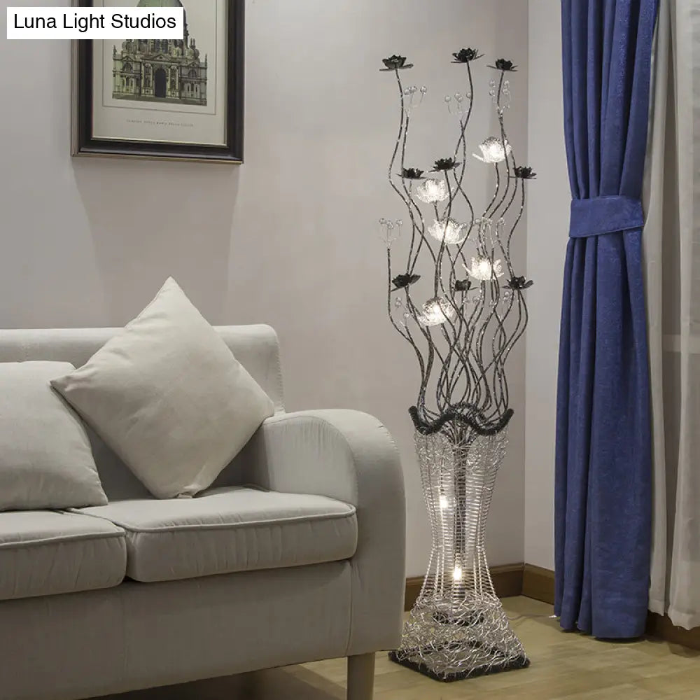 Contemporary Torch-Like Led Floor Light With Curvy Arm And Floret Decor In Black/Silver