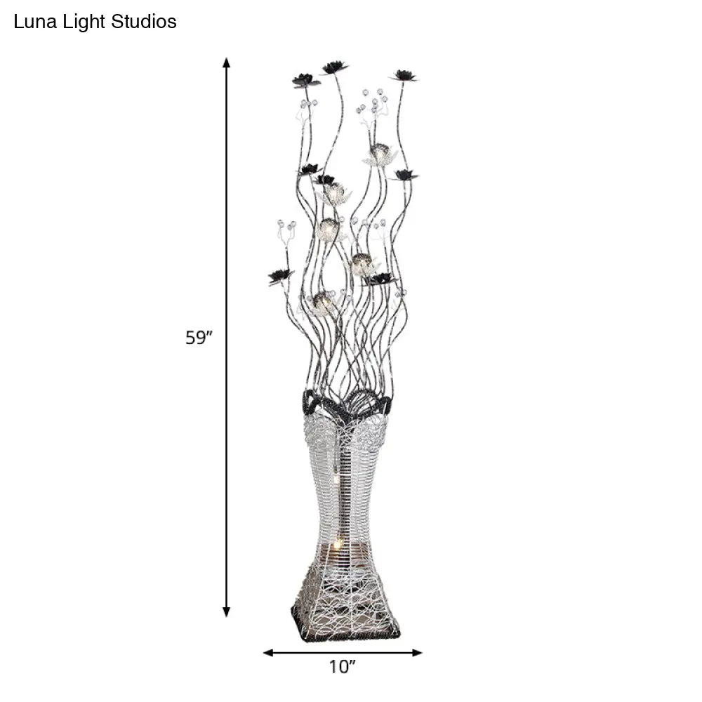 Contemporary Torch-Like Led Floor Light With Curvy Arm And Floret Decor In Black/Silver