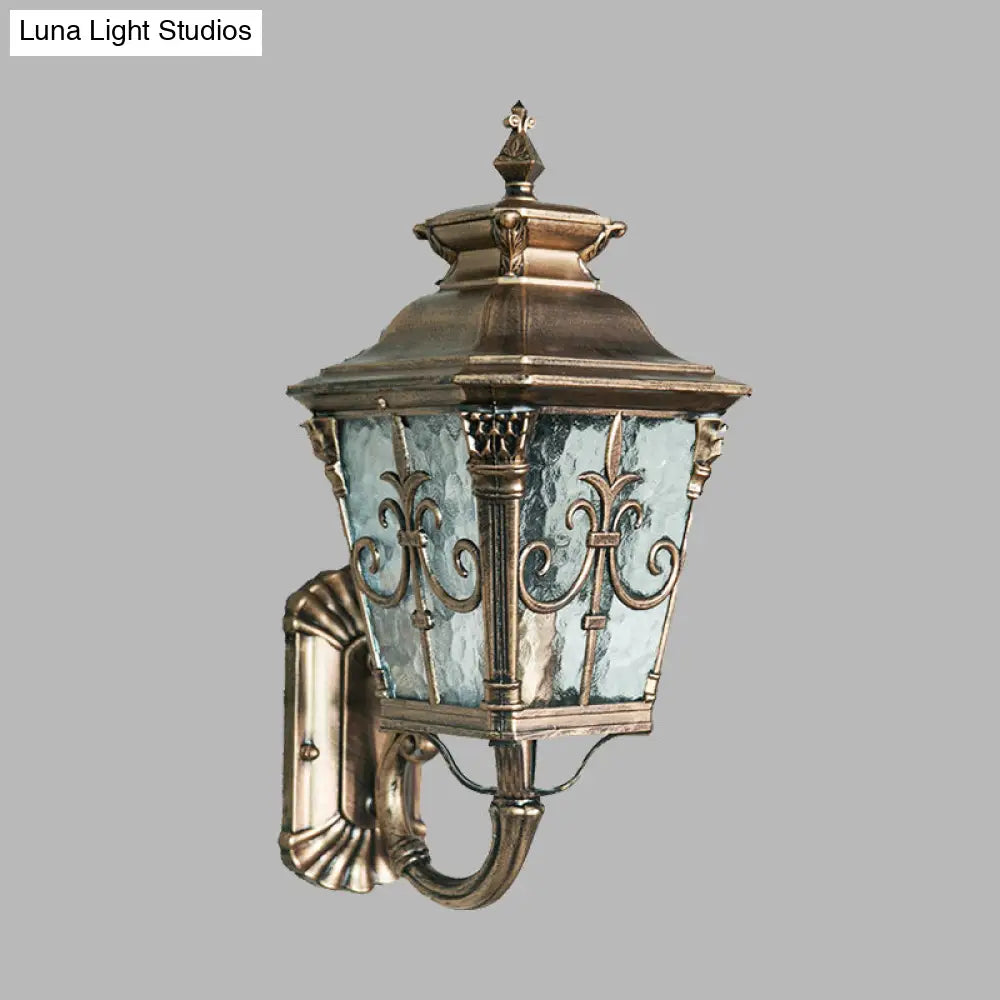 Country Brass Outdoor Wall Sconce With Pointed Flower Design