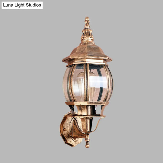 Country Outdoor Wall Light With Clear Glass Shade In Brass - 1 Bulb Fixture
