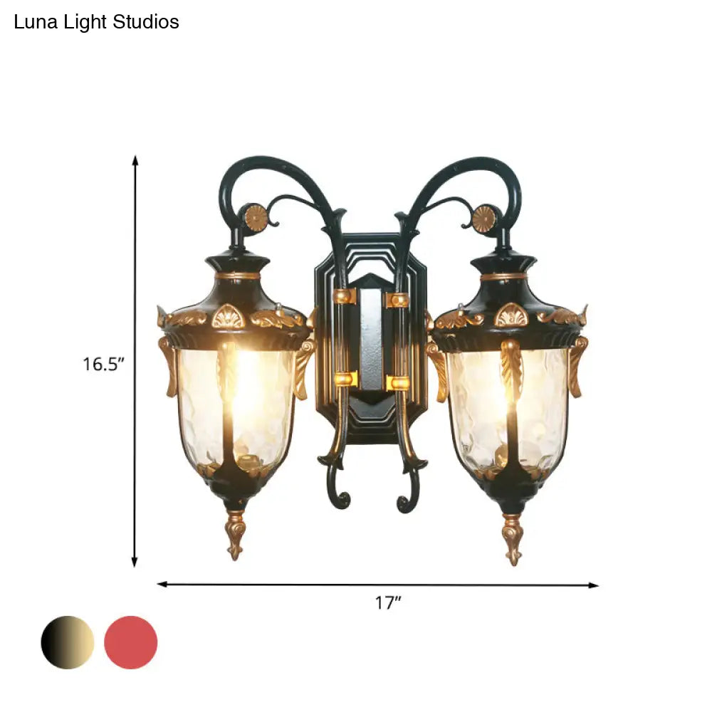 Countryside Black/Gold-Copper Urn Wall Sconce Light With Clear Glass - 2 Bulbs