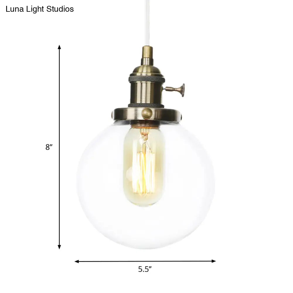 Farmhouse Orbit Pendant Light With Amber/Clear Glass And Adjustable Cord In 3 Elegant Finish Options