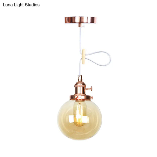 Farmhouse Orbit Pendant Light With Amber/Clear Glass And Adjustable Cord In 3 Elegant Finish Options