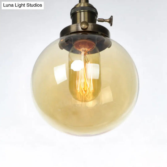 Farmhouse Orbit Pendant Light With Amber/Clear Glass And Adjustable Cord In 3 Elegant Finish Options