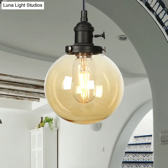 Farmhouse Orbit Pendant Light With Amber/Clear Glass And Adjustable Cord In 3 Elegant Finish