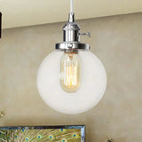 Farmhouse Orbit Pendant Light With Amber/Clear Glass And Adjustable Cord In 3 Elegant Finish