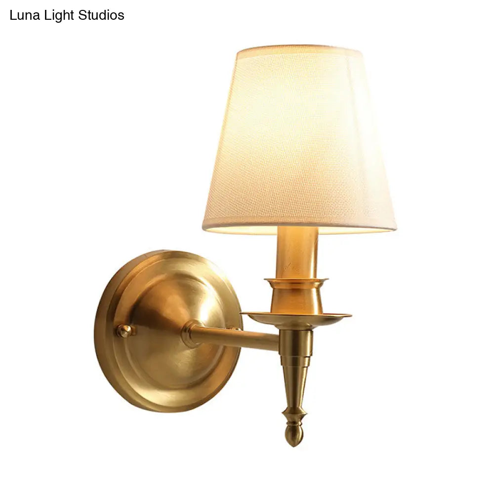 Gold Cone Wall Sconce With Single-Bulb Fabric Mount For Minimalist Lighting